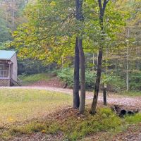 Ohio hunters get-a-way with off grid cabins bordering Wayne National Forest at the end of a dead-end gravel road